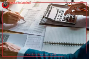 ماشین حساب و دست و کاغذ برای مقاله تعریف حسابداری